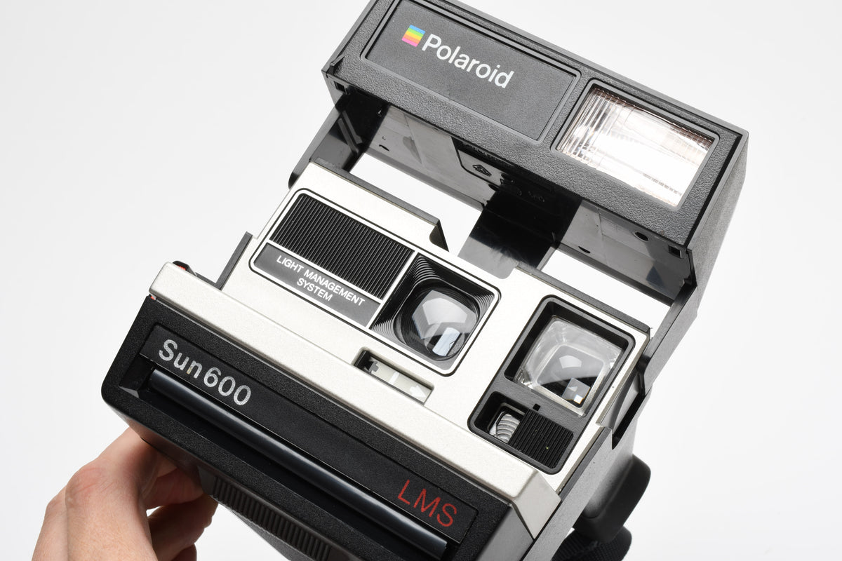 Polaroid Sun 600 LMS Instant camera w/strap, tested