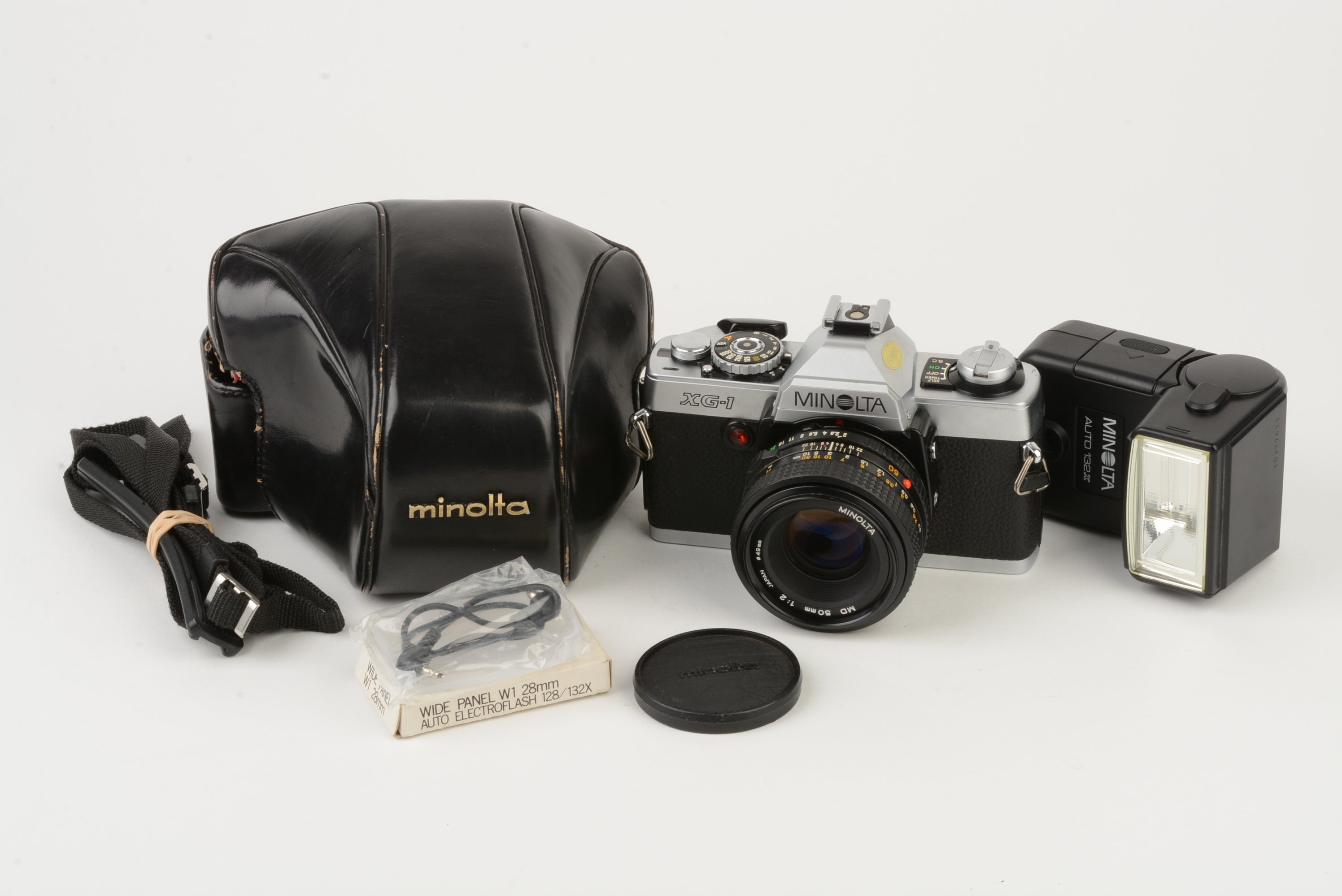 Minolta XG-1 35mm SLR w/MD 50mm F2 lens, case, 132X Flash, New seals,  tested, Nice!