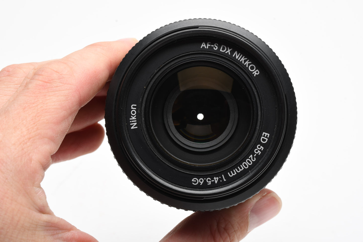 Nikon AFS Nikkor 55-200mm F4-5.6G ED DX zoom lens, caps, pouch, manual