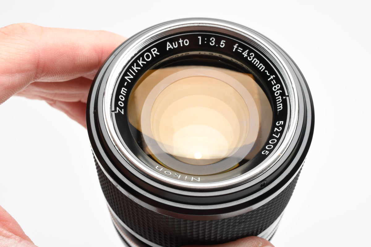 Nikon Zoom Nikkor 43-86mm f3.5 Non-Ai lens w/ UV filter and caps, Nice!