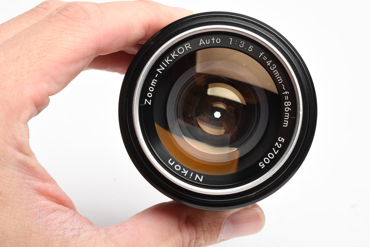 Nikon Zoom Nikkor 43-86mm f3.5 Non-Ai lens w/ UV filter and caps, Nice!
