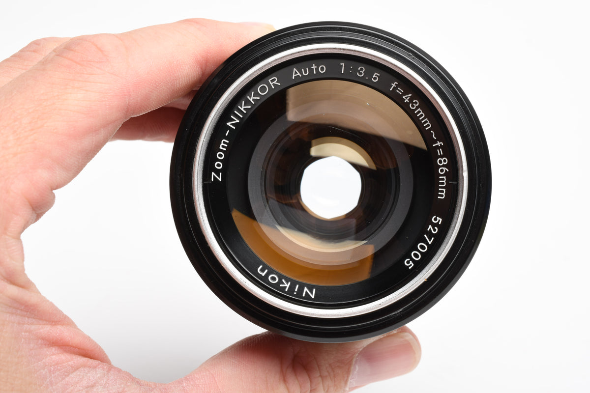 Nikon Zoom Nikkor 43-86mm f3.5 Non-Ai lens w/ UV filter and caps, Nice!