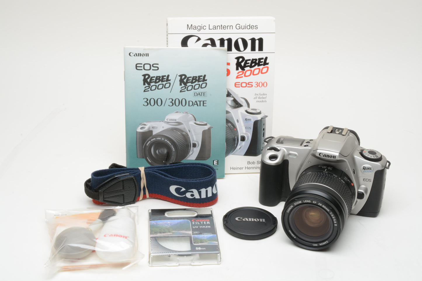 Canon Rebel 2000 35mm SLR w/EF 28-80mm f3.5-5.6 II zoom lens, manuals, strap