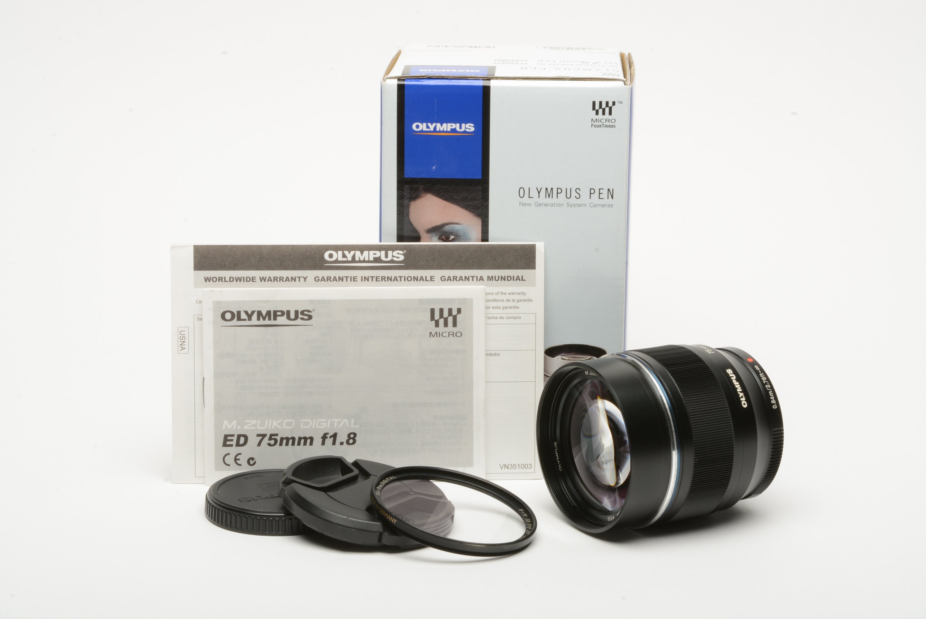 Olympus M. Zuiko ED 75mm f1.8 ED lens w/hood, caps, B+W XS-Pro UV