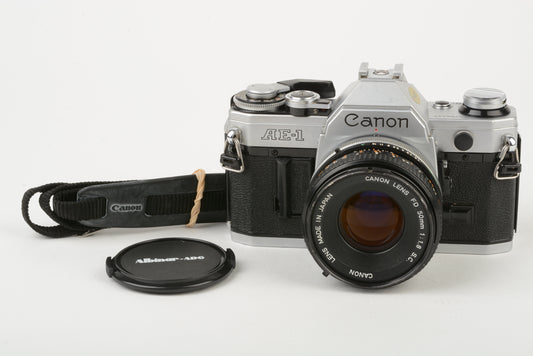 Canon AE-1 35mm SLR Camera w/Canon FD 50mm f/1.8 Prime Lens, new seals