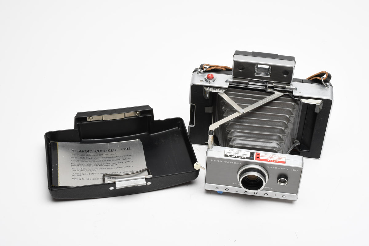 Polaroid Automatic 100 Instant camera w/strap