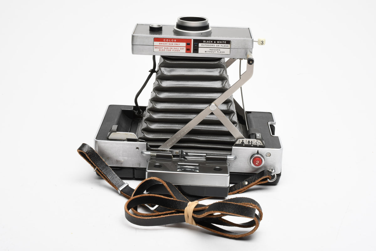 Polaroid Automatic 100 Instant camera w/strap