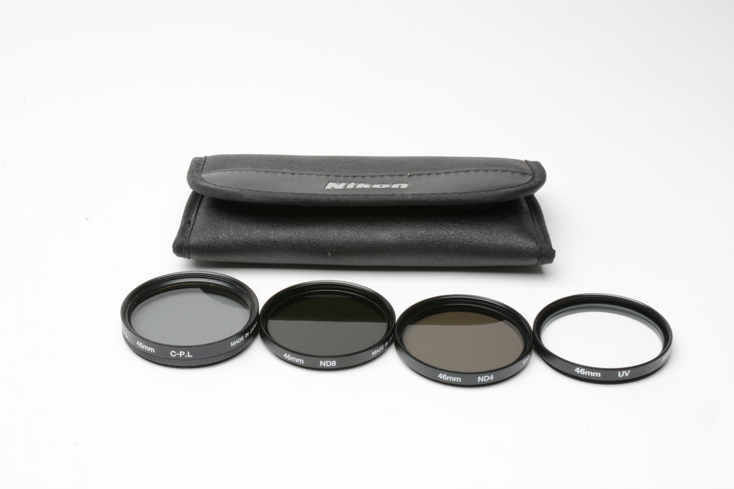 Set of 4 46mm filters (UV, Pola, ND4, ND8) in pouch, clean