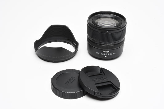 Nikon Nikkor DX 12-28mm f3.5-5.6 PZ zoom lens, Hood, Caps, Mint-