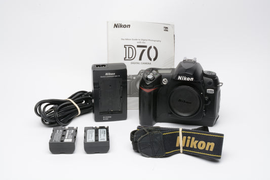 Nikon D70 DSLR body w/2batts, charger, strap, book, 33K Acts