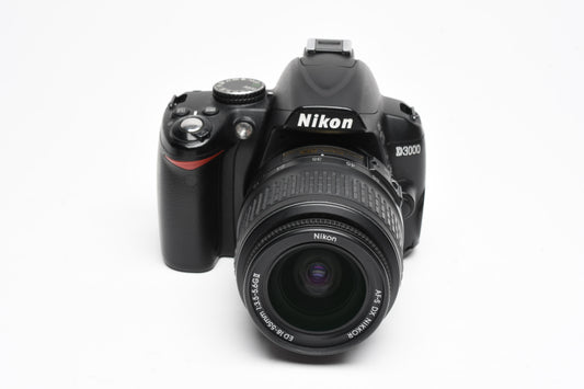 Nikon D3000 DSLR w/Nikkor AFS 18-55mm f3.5-5.6G VR Lens, Batt, Charger, Only 7807 Acts!