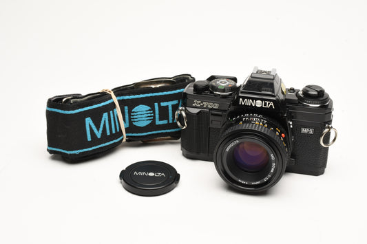 Minolta X700 35mm SLR w/50mm f1.7 lens, strap, cap, Sky, new seals, Great