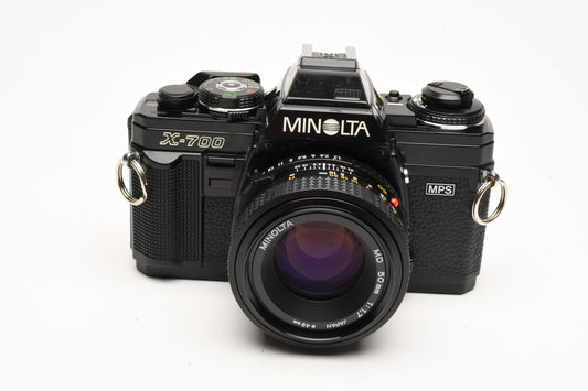 Minolta X700 35mm SLR w/50mm f1.7 lens, strap, cap, Sky, new seals, Great