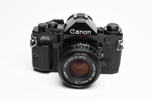 Canon A-1 35mm SLR w/ 50mm f1.8 FD Lens, Canvas Strap, New Seals, Great!