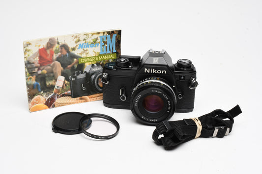 Nikon EM 35mm SLR w/Nikon Series E 50mm f1.8 Lens, Strap, Manual, 1A Filter, New Seals!