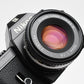 Nikon EM 35mm SLR w/Nikon Series E 50mm f1.8 Lens, Strap, Manual, 1A Filter, New Seals!