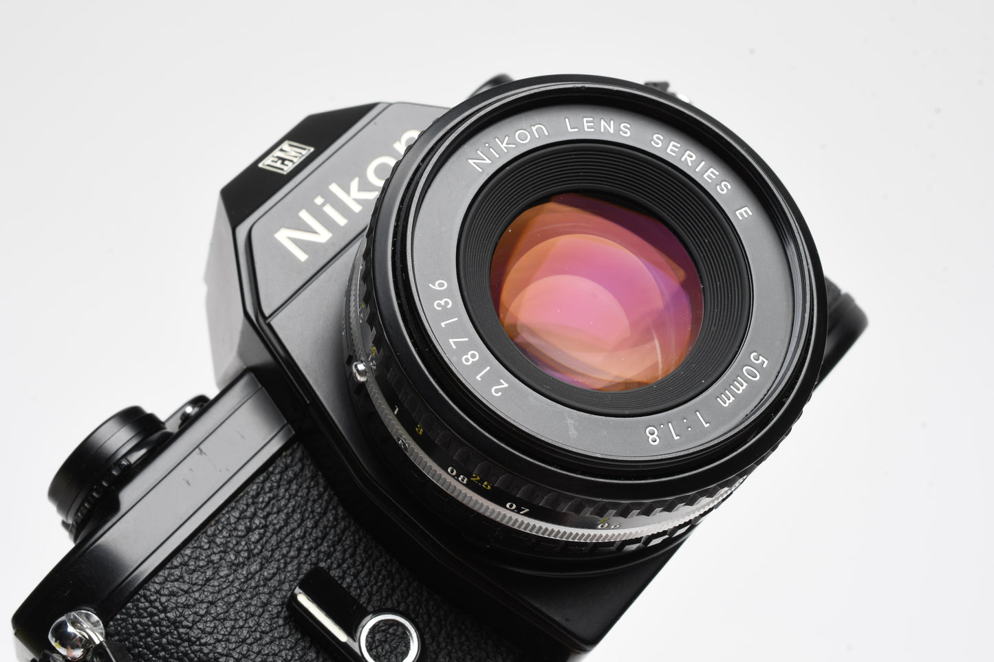 Nikon EM 35mm SLR w/Nikon Series E 50mm f1.8 Lens, Strap, Manual, 1A Filter, New Seals!