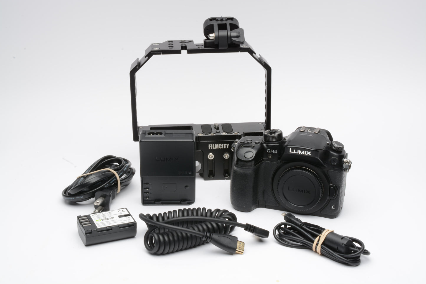 Panasonic Lumix DMC-GH4 Body, Cage, batt, charger, strap, Only 2008 Acts