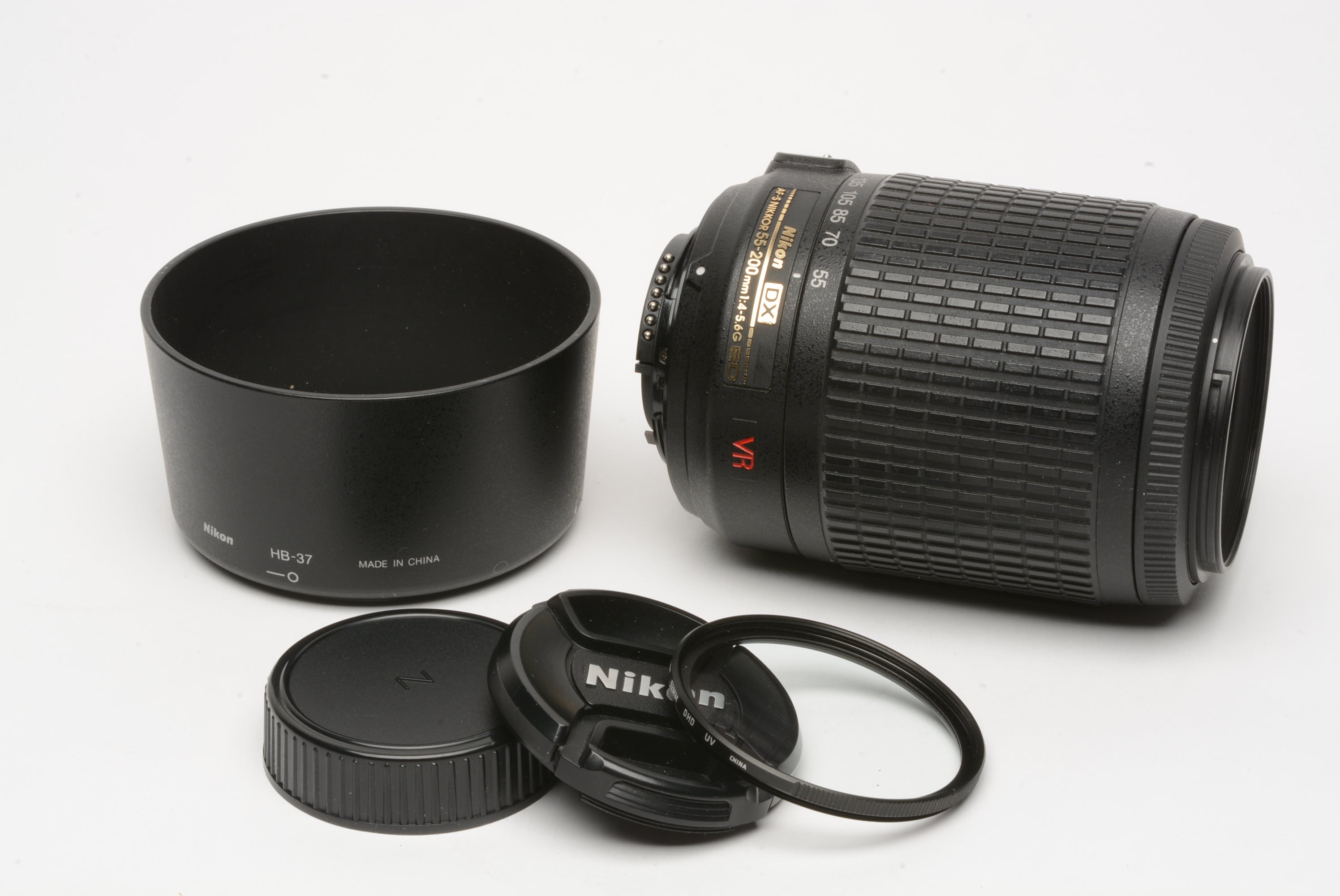 Nikon AFS Nikkor 55-200mm F4-5.6G ED DX VR zoom lens, caps