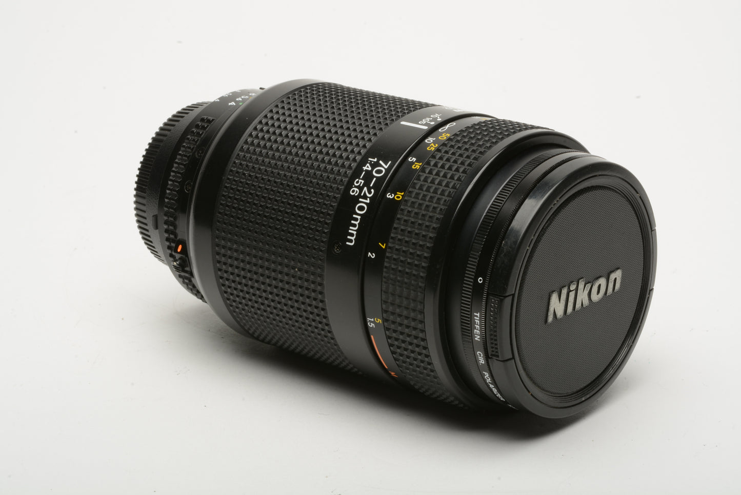 Nikon AF 70-210mm F4-5.6 zoom, caps + circular polarizing filter, nice