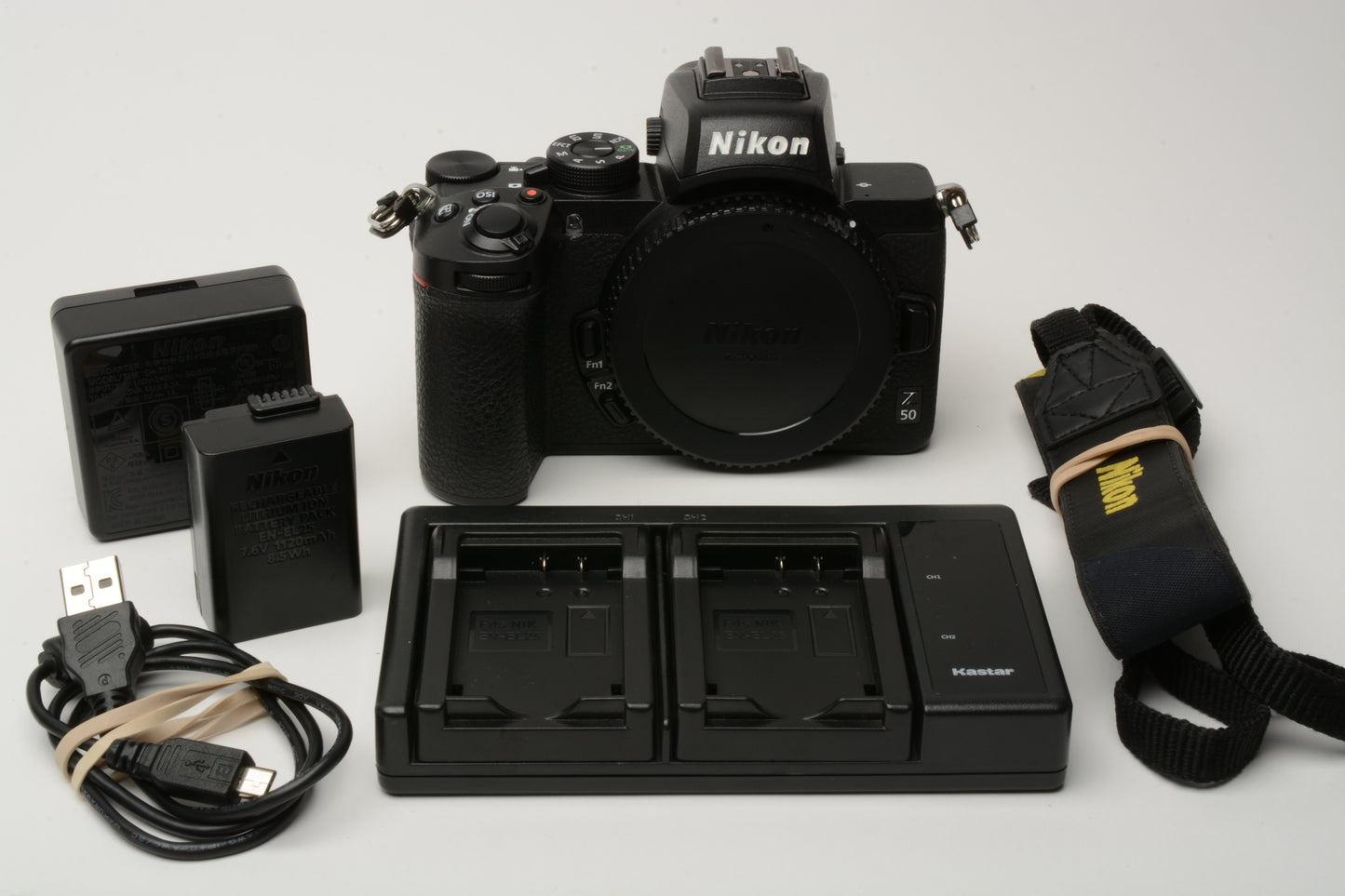 Nikon Z50 Mirrorless Body, Nikon battery, dual charger, strap, 17k acts