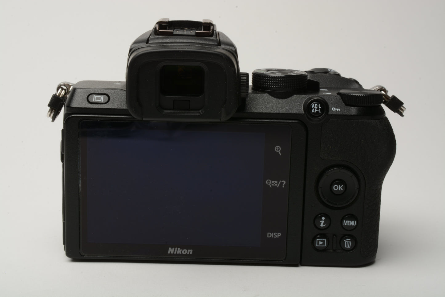 Nikon Z50 Mirrorless Body, Nikon battery, dual charger, strap, 17k acts