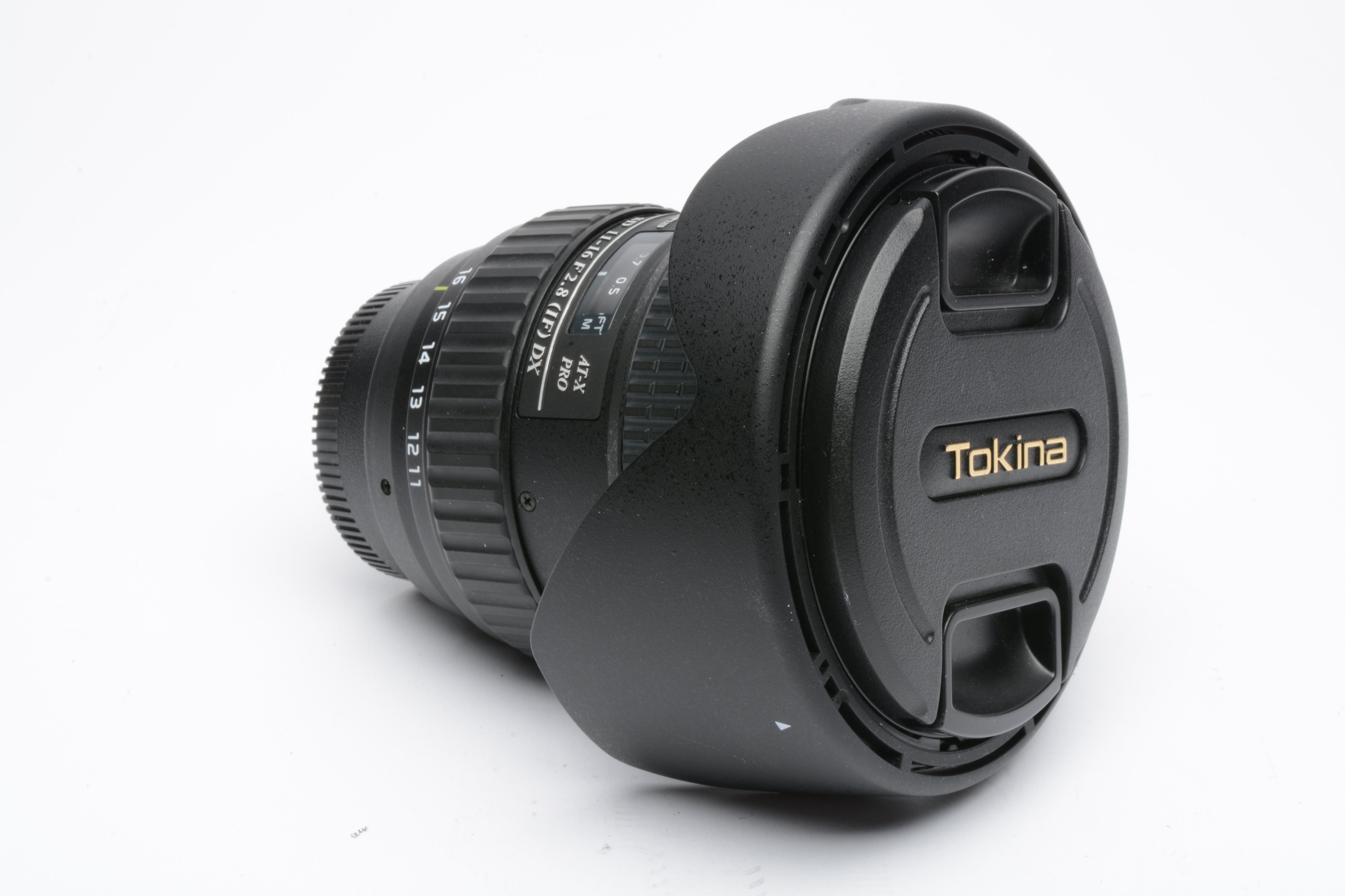Tokina AT-X PRO SD 11-16mm F2.8 (IF) DX for Nikon F Mount, caps 