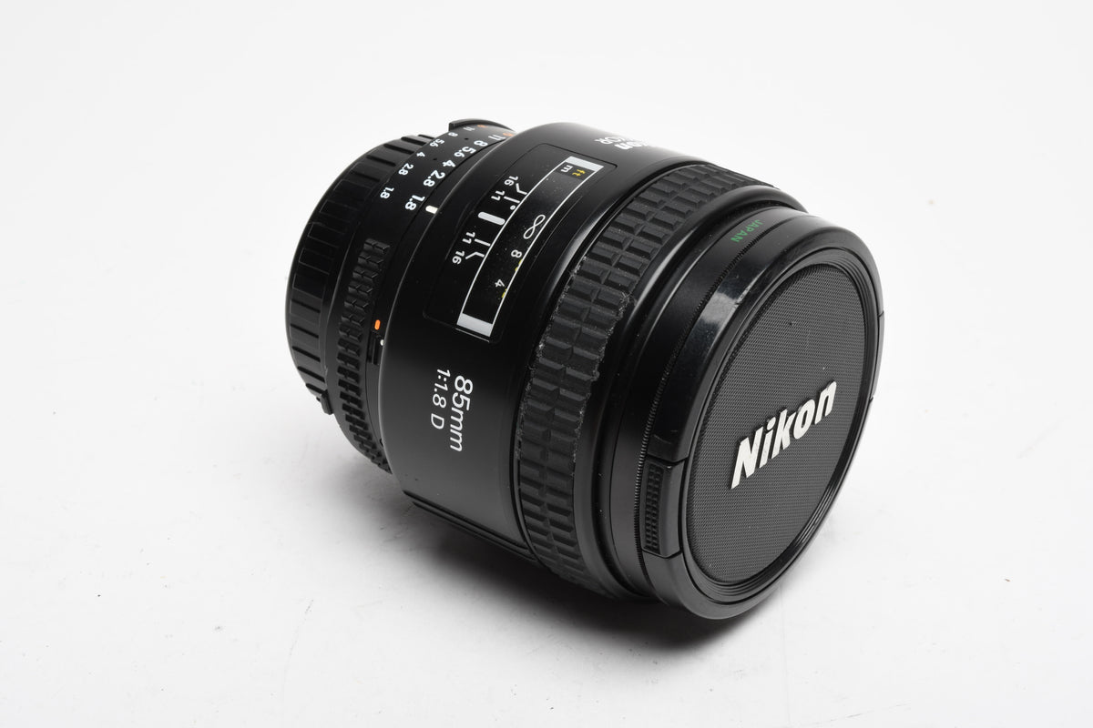Nikon AF Nikkor 85mm F1.8D portrait lens, caps, clean and sharp! +UV