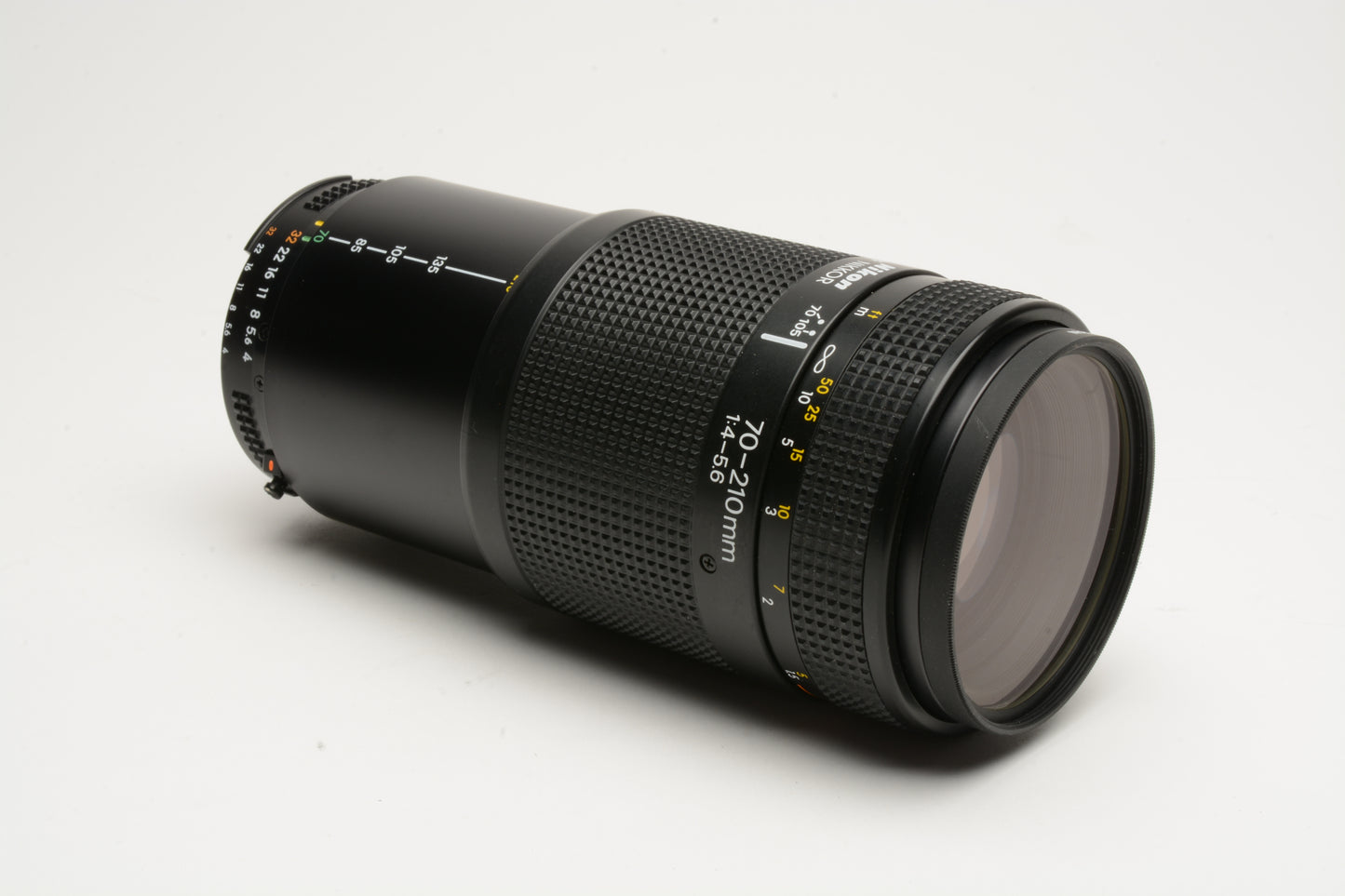 Nikon AF 70-210mm F4-5.6 zoom, very clean, UV + Manual + caps