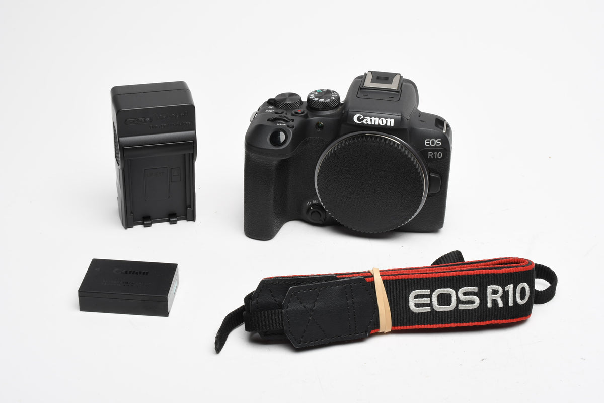 Canon EOS R10 Mirrorless Body w/Canon battery, charger, strap, ≤15,000 Acts