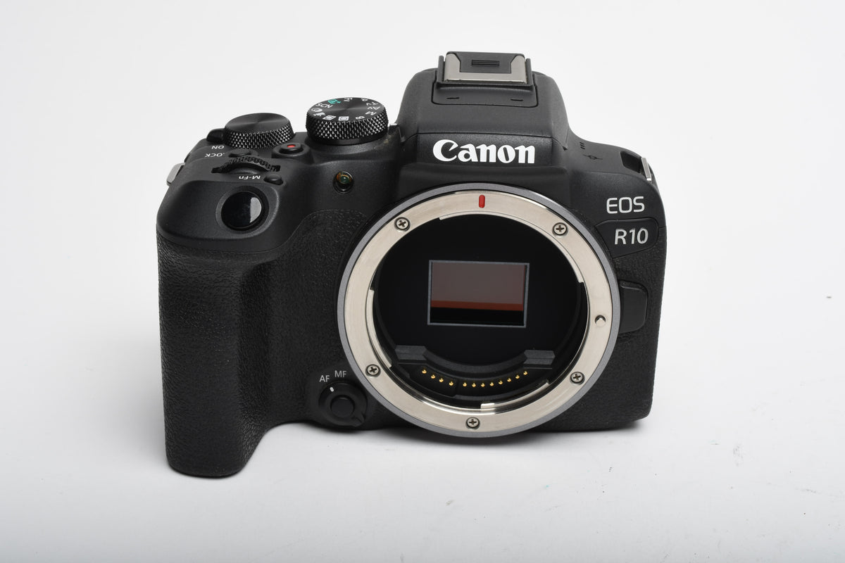 Canon EOS R10 Mirrorless Body w/Canon battery, charger, strap, ≤15,000 Acts