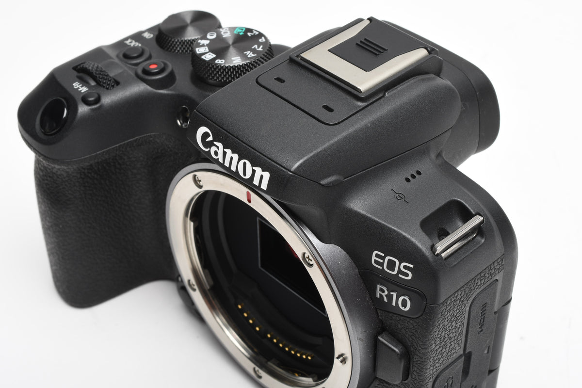 Canon EOS R10 Mirrorless Body w/Canon battery, charger, strap, ≤15,000 Acts