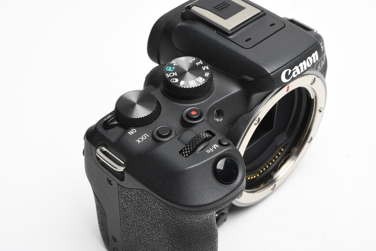 Canon EOS R10 Mirrorless Body w/Canon battery, charger, strap, ≤15,000 Acts