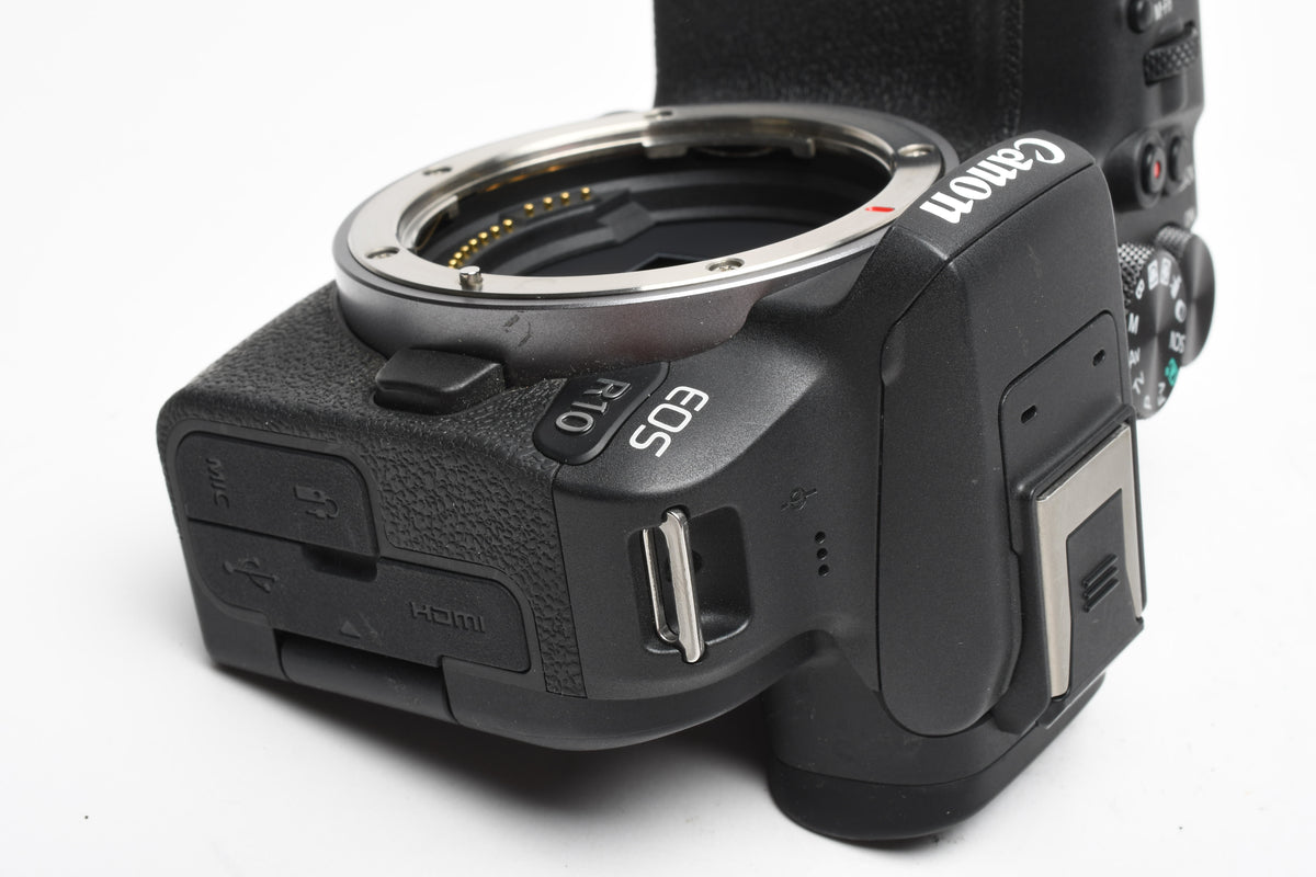 Canon EOS R10 Mirrorless Body w/Canon battery, charger, strap, ≤15,000 Acts