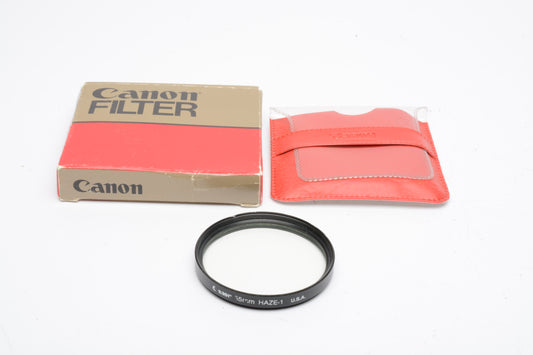 Canon 55mm UV haze filter in pouch / box, Very clean, genuine