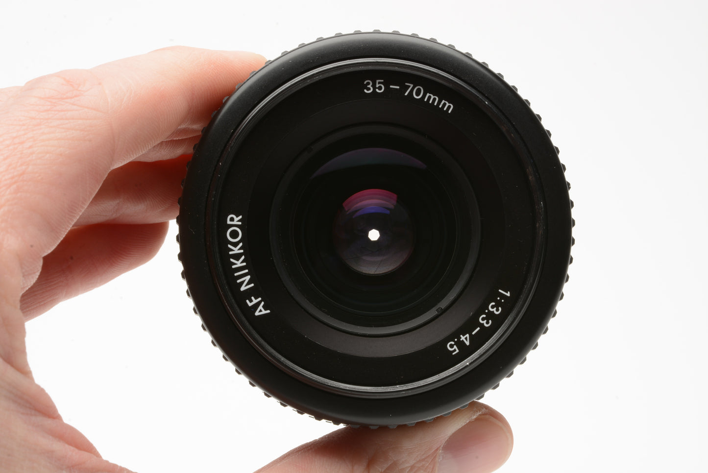 Nikon AF 35-70mm f3.3-4.5 macro zoom lens, caps + pola filter, clean