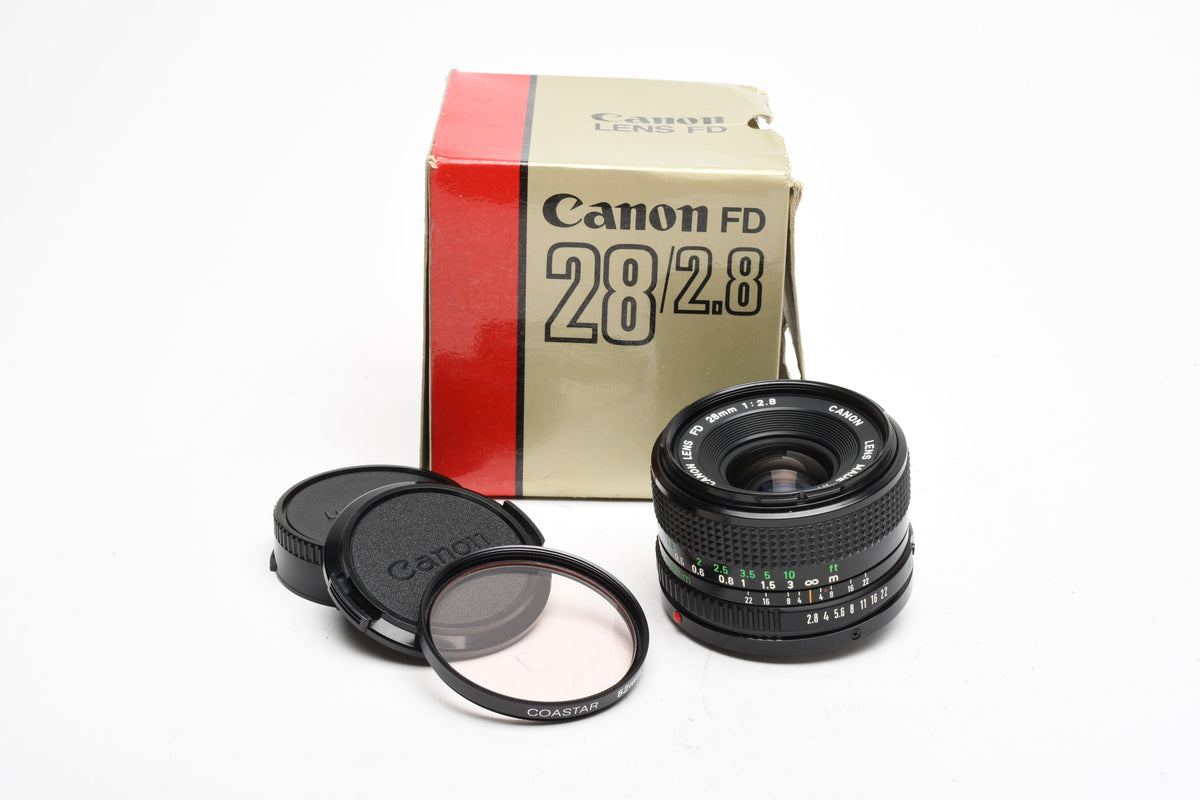 Canon FD 28mm f2.8 wide angle lens, caps, 1A, Mint-, Box