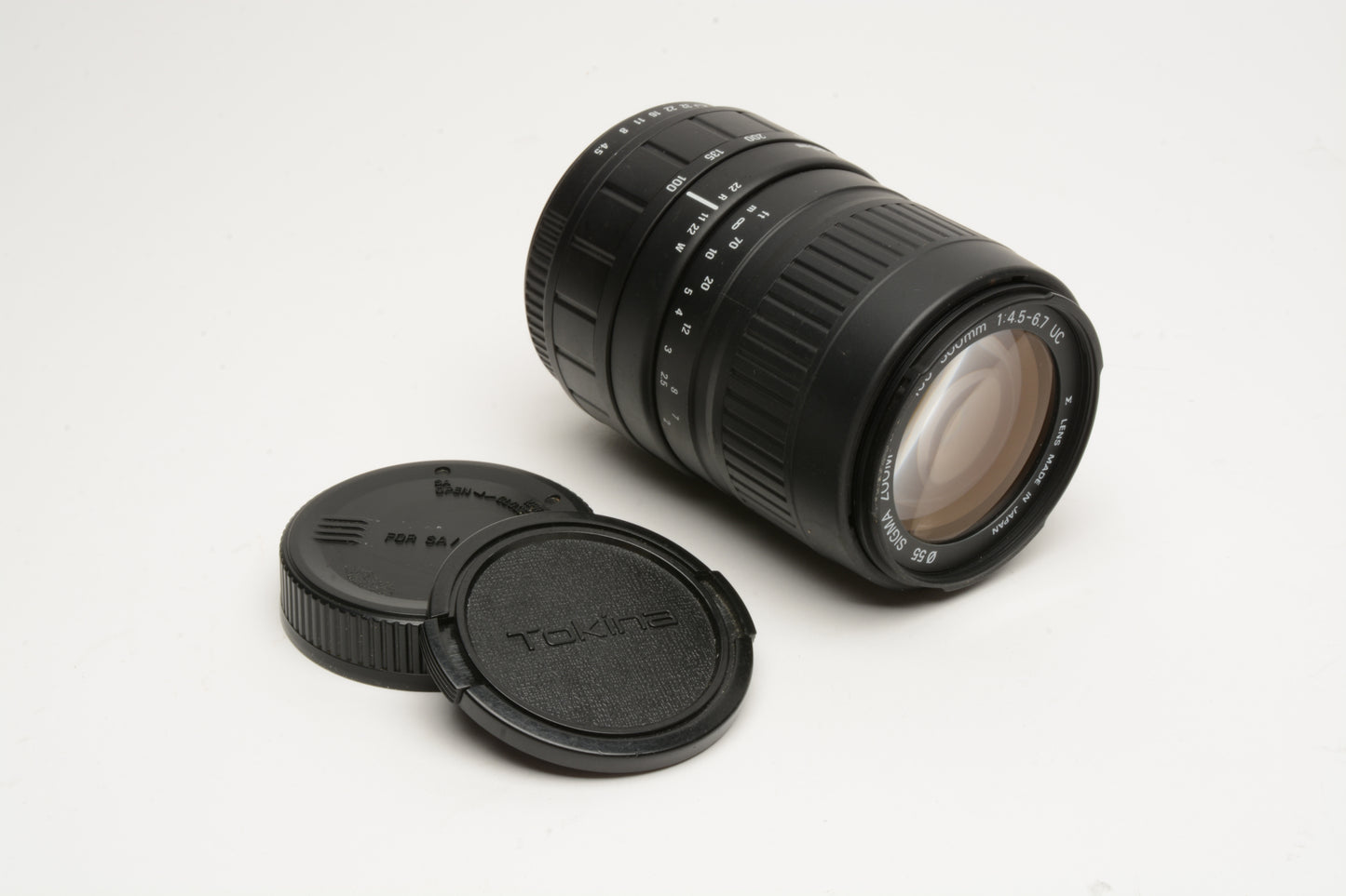Sigma AF 100-300mm f4.5-6.7 UC Telephoto zoom lens for Pentax AF, caps