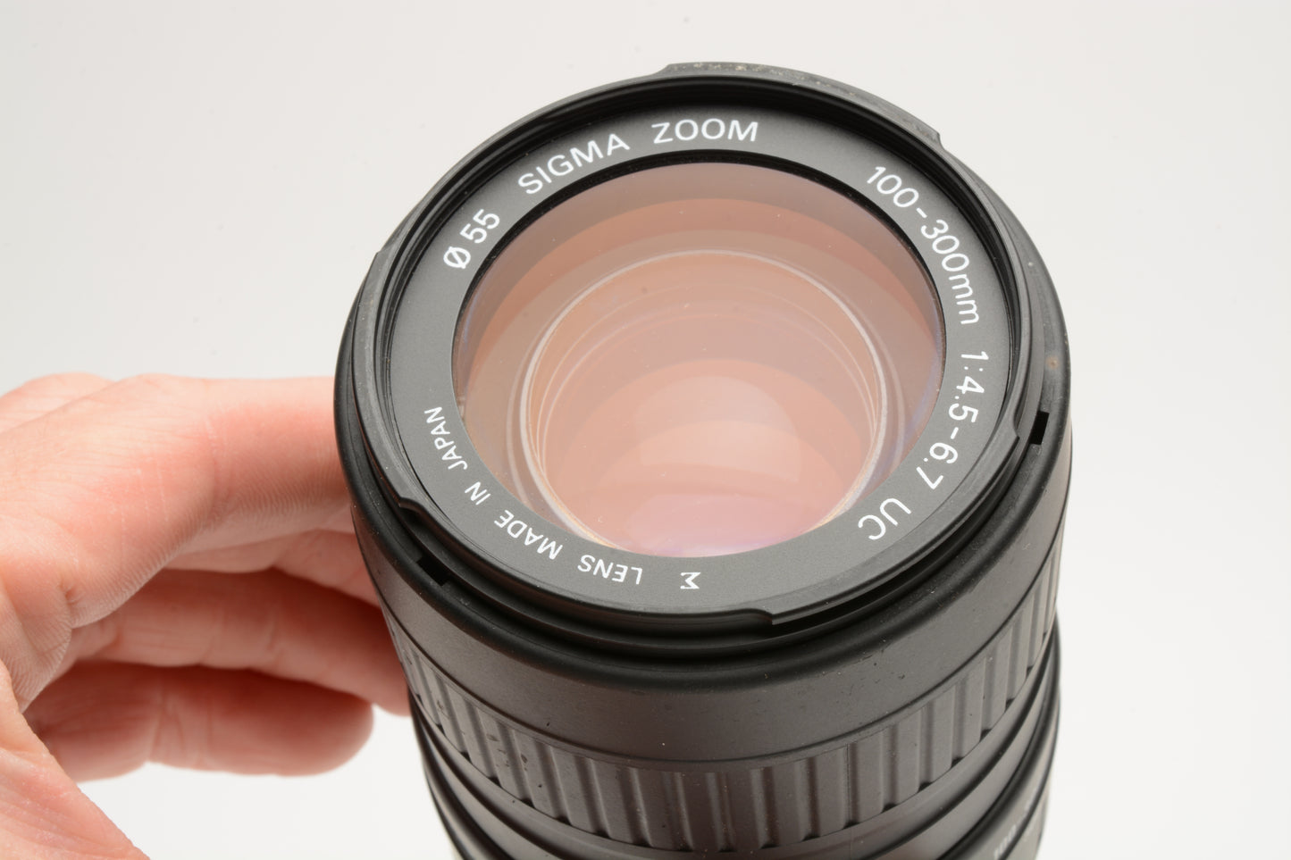 Sigma AF 100-300mm f4.5-6.7 UC Telephoto zoom lens for Pentax AF, caps