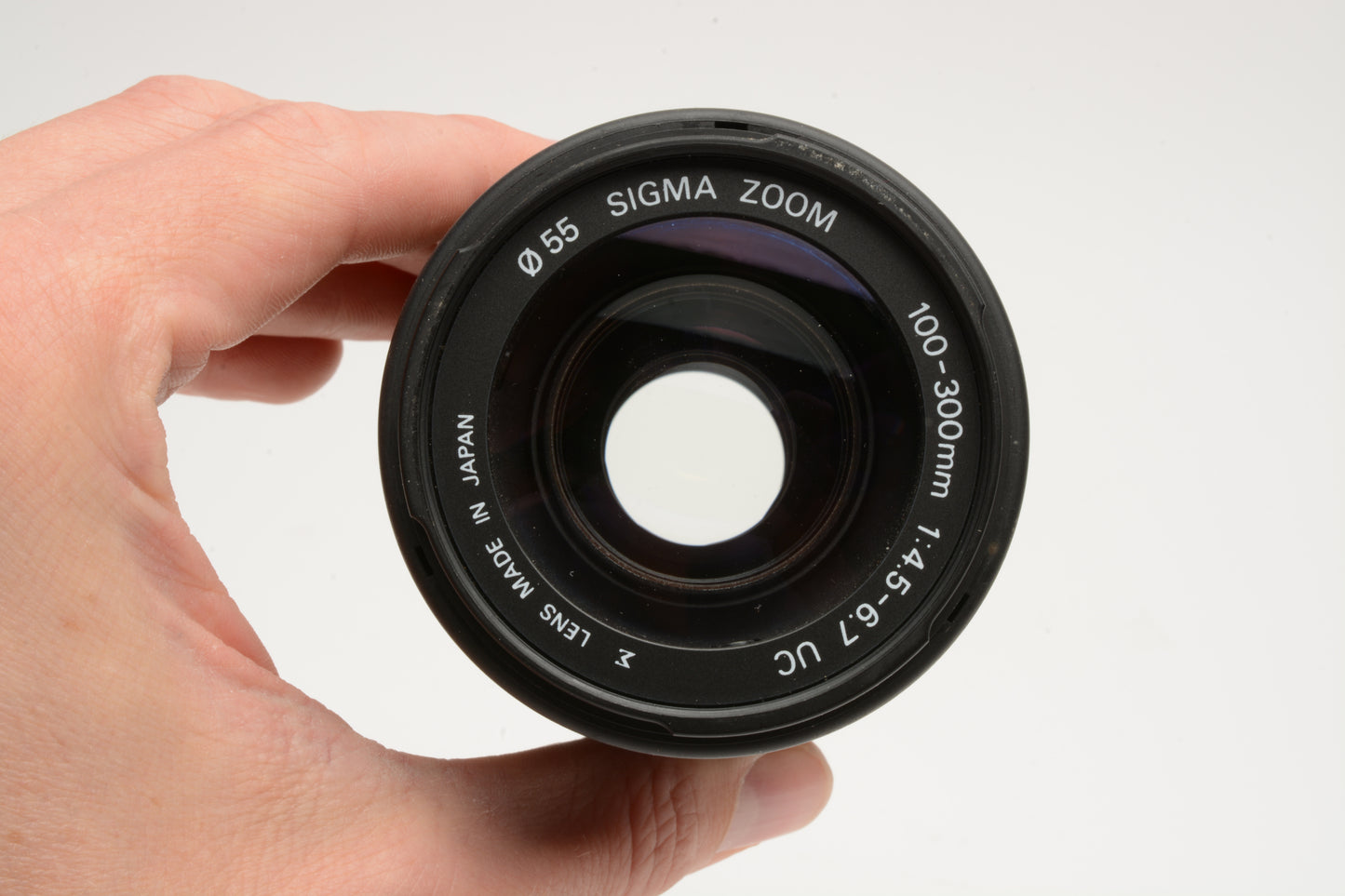 Sigma AF 100-300mm f4.5-6.7 UC Telephoto zoom lens for Pentax AF, caps