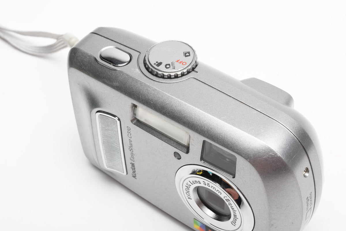 Kodak EasyShare C310 4MP Digital Point&Shoot camera (Silver), Strap, Good