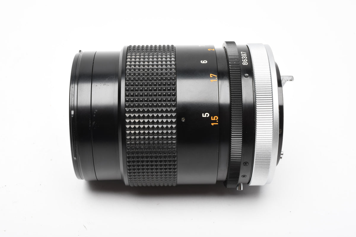 Canon 135mm F3.5 S.C. FD lens, caps, Sky, clean and sharp