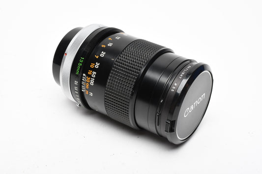Canon 135mm F3.5 S.C. FD lens, caps, Sky, clean and sharp