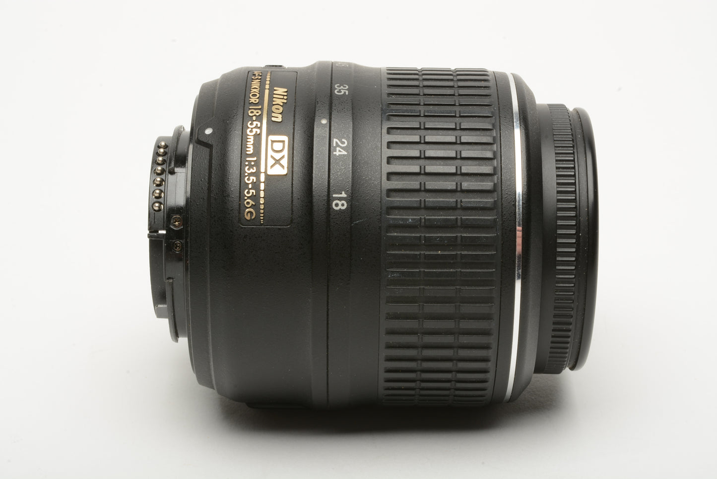 Nikon AF-S 18-55mm f3.5-5.6 G DX VR zoom lens, caps + lens hood + UV