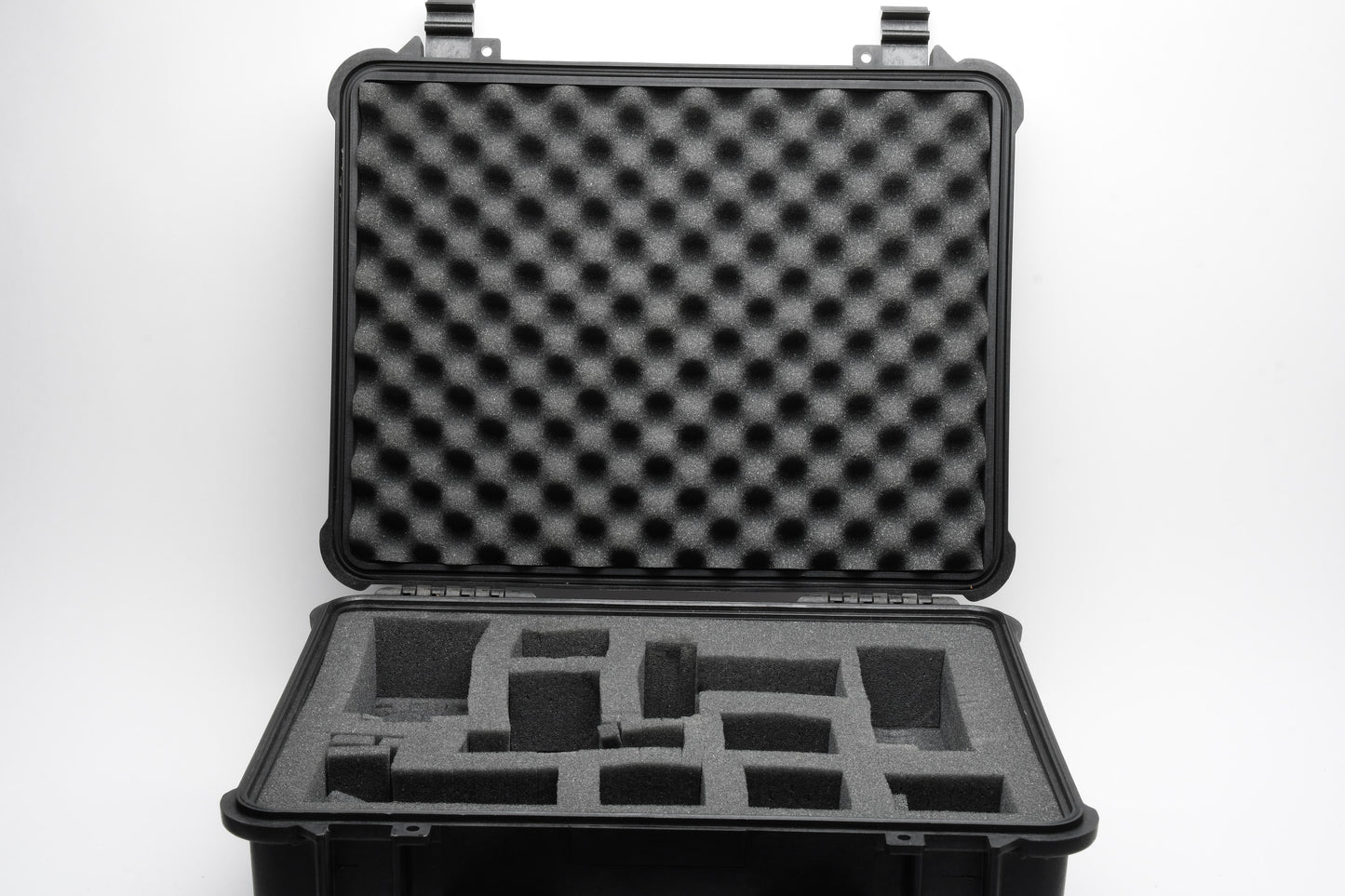 Pelican 1550 Black weatherproof case 20.7 × 17.2 × 8.4", clean, w/cut-up foam