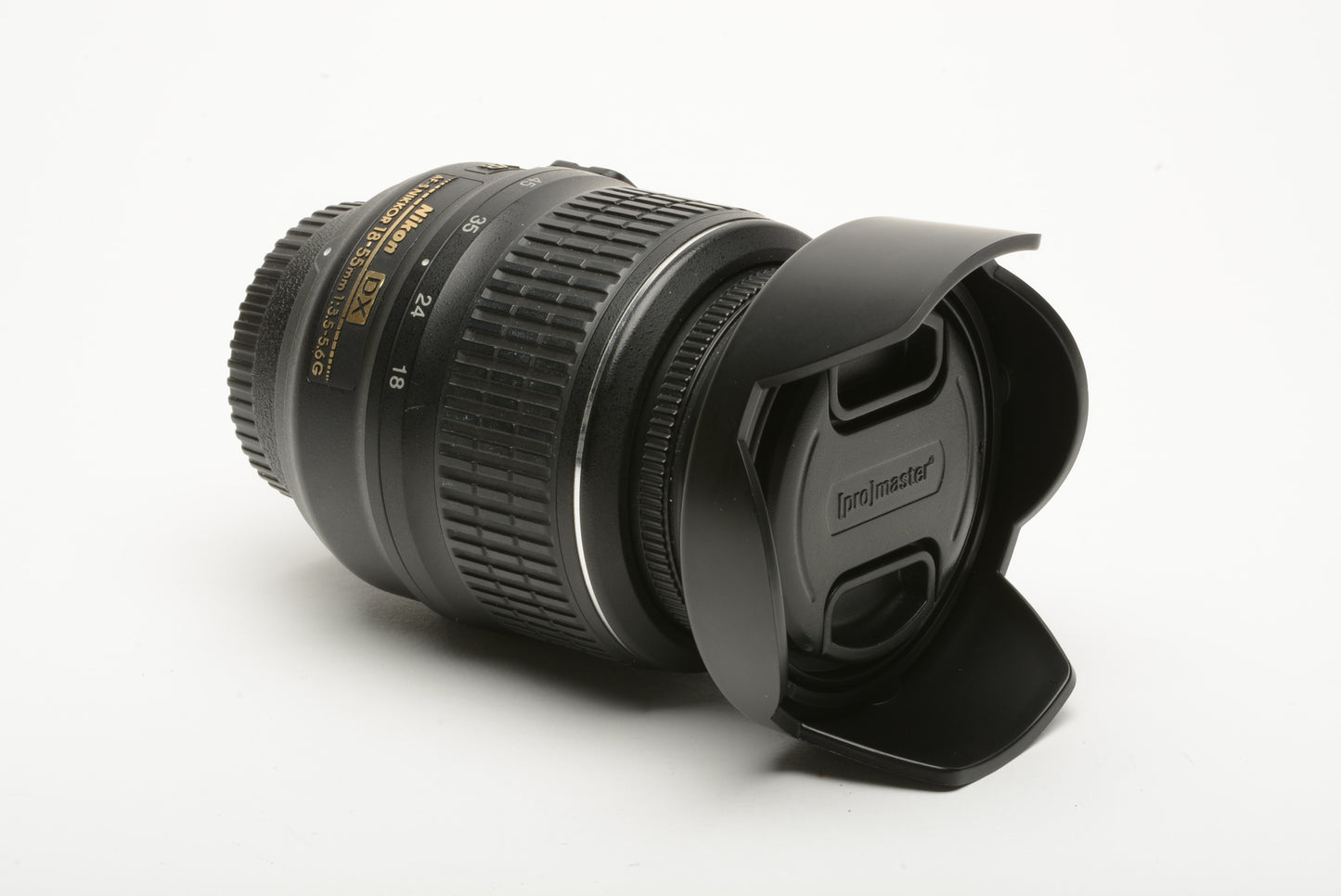 Nikon AF-S 18-55mm f3.5-5.6 G DX VR zoom lens, caps + lens hood + UV