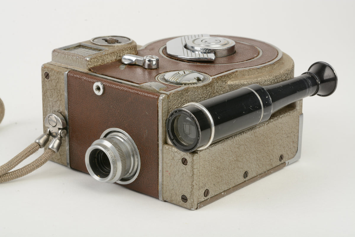 Revere Eight Model 70 Magazine Cine 8mm Movie Camera, strap, works! Vintage