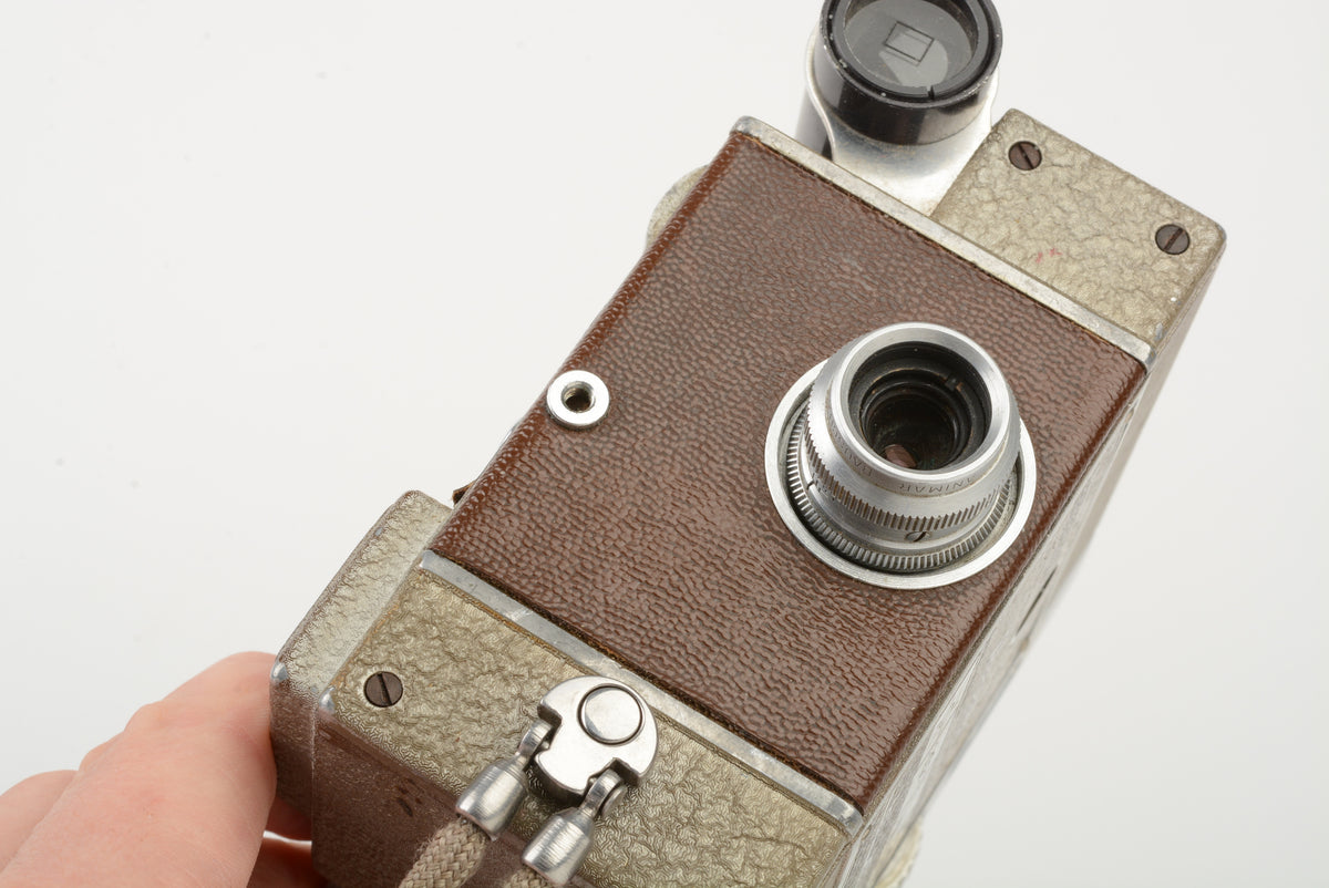 Revere Eight Model 70 Magazine Cine 8mm Movie Camera, strap, works! Vintage
