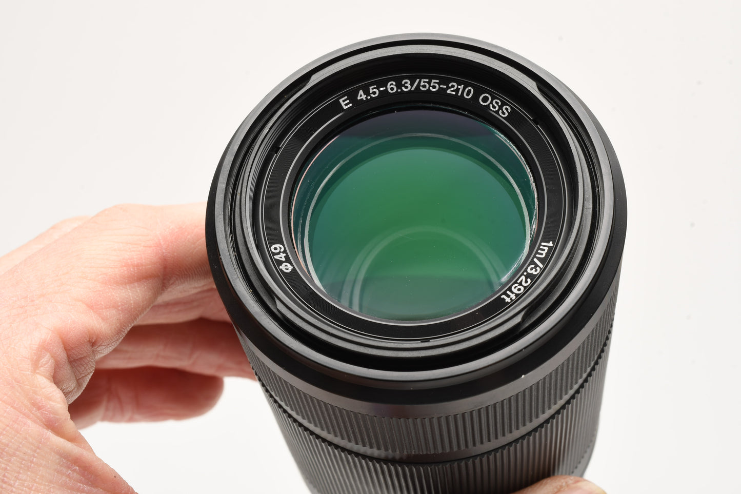 Sony 55-210mm f4.5-6.3 OSS zoom lens (Black) w/Lens caps, Lens hood