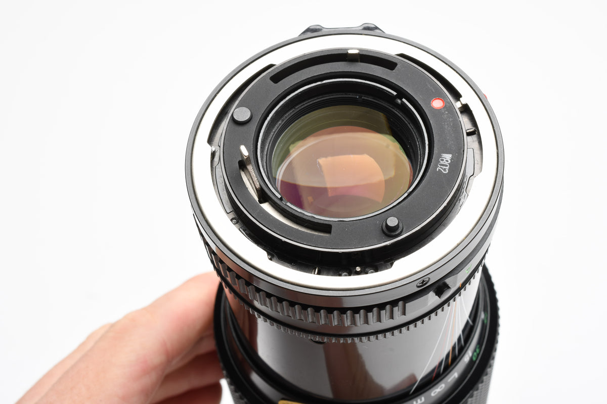 Canon FD 70-210mm f4 zoom lens, caps, case, smooth, Good!